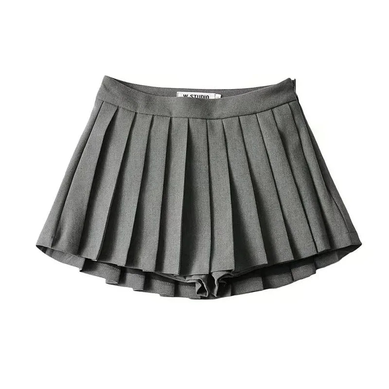 Spice girl pleated skirt female pure color small short skirt summer new Korean version JK college wind high waist mini skirt