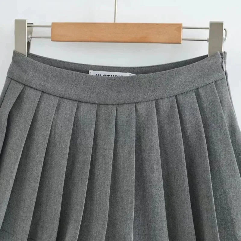 Spice girl pleated skirt female pure color small short skirt summer new Korean version JK college wind high waist mini skirt
