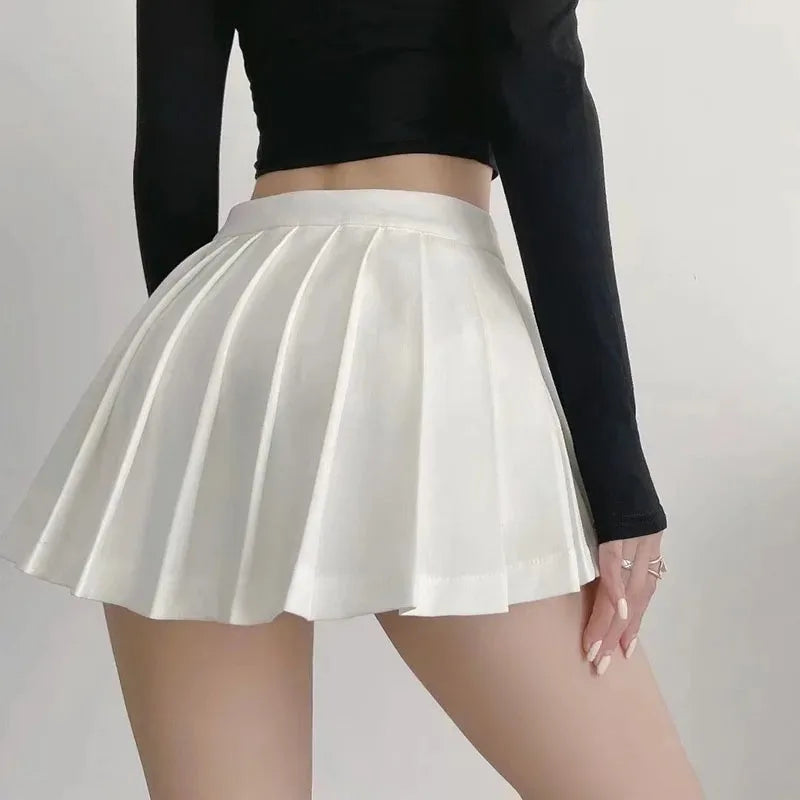 Spice girl pleated skirt female pure color small short skirt summer new Korean version JK college wind high waist mini skirt